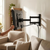 QualGear 23-42 in Full Motion TV Wall Mount with Swivel Arm, Black in use, lifestyle view