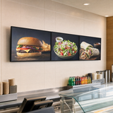 QualGear Triple Screen Menu Board Tilt Wall Mount, Black in use, lifestyle view